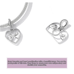 Detail of S925 sterling silver pinky swear heart charm with intricate hand engraving