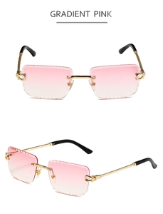 Detail of gradient pink rimless sunglasses with gold twisted metal temples and black tips