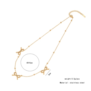 Detail of golden stainless steel bow necklace with size and weight measurements
