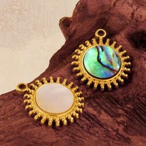 Stainless steel sun pendant necklace featuring natural white shell and abalone inlay details