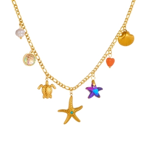 Golden sea animal necklace featuring colorful starfish turtle and shell pendants on white background
