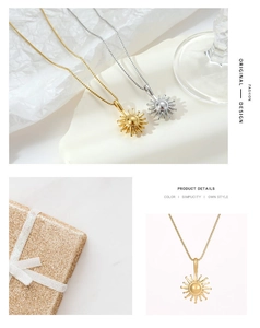 Detail showing gold and silver sunflower necklaces with branded gift packaging box