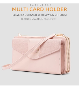 Detail of light pink crossbody phone bag featuring multi-layer gold zippers and fine stitching