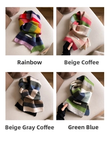 Close-up of fluffy mohair scarfs in colorful rainbow and earth tone striped patterns