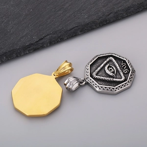 Octagonal Eye of Horus pendants in gold and silver steel finish shown from front and back