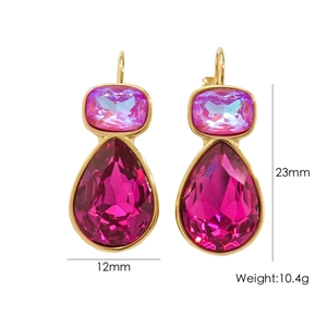 Detail showing pink teardrop crystal earrings with 12mm width and 23mm height dimensions