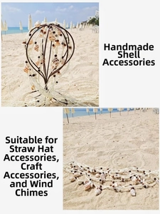 Handmade shell hat band detail with spiral seashells and dark wooden beads on sand