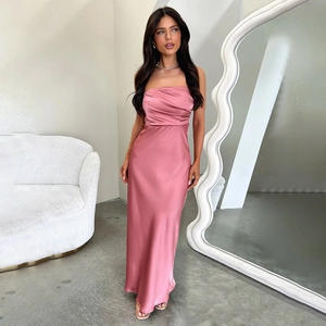 Detailed view of pink satin tube dress fabric texture and elegant slim-fit tailoring