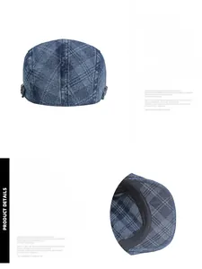 Detail of adjustable metal buckle and plaid denim texture on newsboy cap back