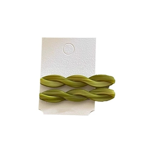 Romantic green twisted acetate hair clips on white card packaging for women's hairstyle