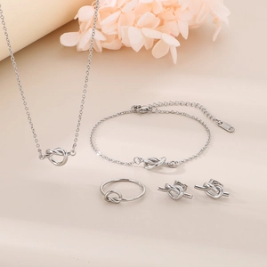 Silver 18K gold plated knotted jewelry set with necklace, bracelet, ring, and earrings