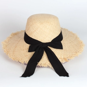 Wide brim raffia sun hat for women with black ribbon bow and fringe edge detail