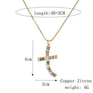 Detailed view of copper cross pendant with colorful zircon stones and size specifications