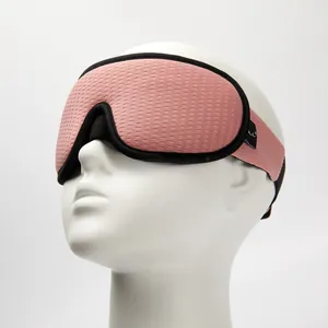 Detailed side view of a pink breathable 3D sleep mask featuring soft mesh fabric on a white model
