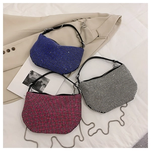 Chic rhinestone shoulder bags in blue, rose, and silver finishes with sleek metal chains