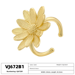 Detailed view of daisy-shaped brass ear clip in gold finish with precise measurements