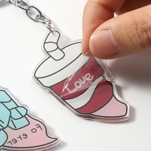 Acrylic beverage cup couple keychains in red and blue with protective film