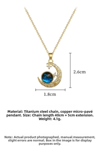 Detail of star and moon necklace with dimensions 2.6cm by 1.8cm on a titanium steel chain