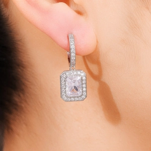 Elegant princess cut faux moissanite drop earrings with silver halo for evening parties
