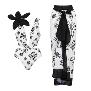 Floral print one-shoulder bikini with matching sarong and large black 3D flower detail