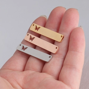 Set of three butterfly cutout rectangle metal pendants in gold rose gold and silver