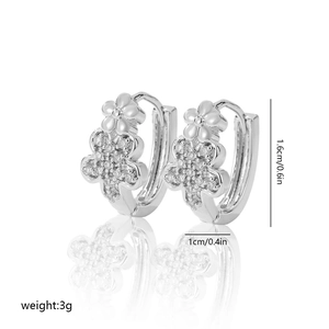 Detail view of silver floral hoop earrings with white zircon pavé and size dimensions