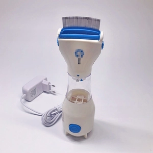 Detail view of electric flea comb with metal teeth, debris filter and power adapter