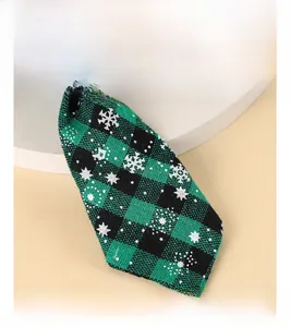 Close-up of green plaid pet necktie in pure cotton showing soft fabric texture