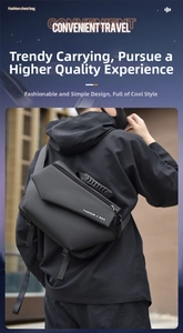 Outdoor shot of men's black crossbody chest bag with geometric faceted design