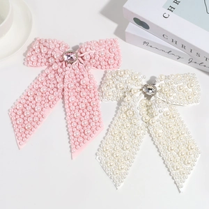 Fashionable pearl rhinestone bow hair clips in pink and white ribbon for women