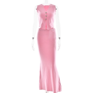 Pink knit two-piece set featuring a V-neck buttoned vest and slim fit maxi skirt