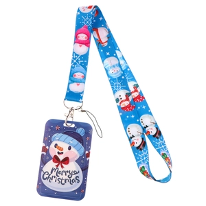 Close-up of Merry Christmas lanyard and card holder set with blue snowman pattern