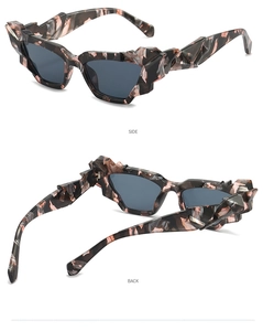 Macro side and back views of irregular geometric sunglasses with marble texture