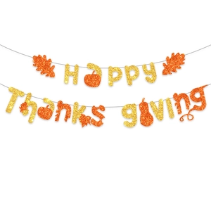 Glittery Happy Thanksgiving banner with orange maple leaves and pumpkin party decor