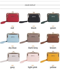 Litchi pattern leather coin purses shown in nine vibrant colors with wrist straps