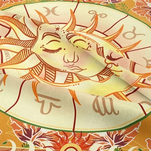 Detailed fabric texture of Bohemian sun and zodiac tapestry with celestial symbols