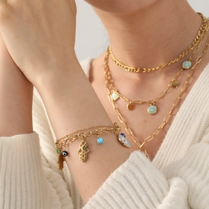 Golden Evil Eye and Hamsa Hand multi-layer bracelet and necklace set for women