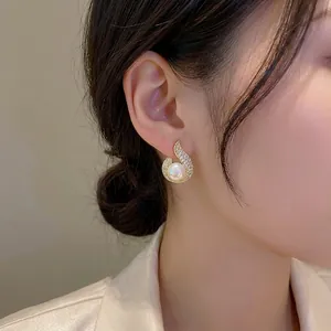 Elegant gold-plated mermaid pearl earrings with zircon fishtail drop design for women