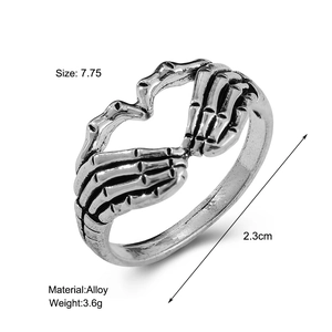 Detail view of silver gothic skeleton heart ring showing 2.3cm diameter and 3.6g weight