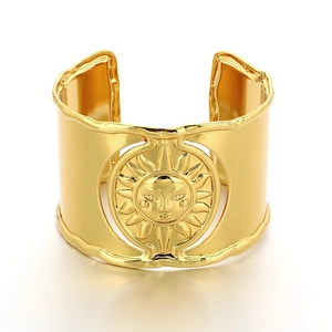 Vintage gold wide cuff bracelet with sun and moon celestial engraving on stainless steel