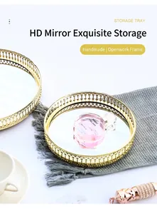 Macro shot of gold metal filigree railing and high-definition mirror tray base