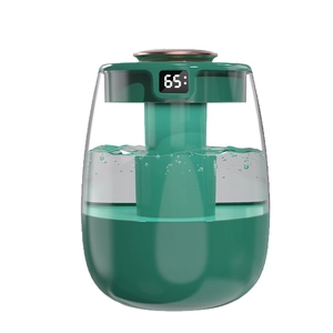 USB desktop humidifier in dark green with rose gold lid and transparent water tank
