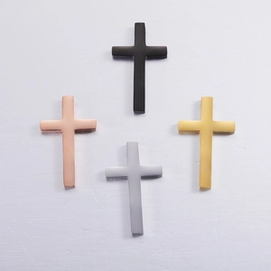 Set of four mirror polished stainless steel cross pendants in black rose gold silver and gold