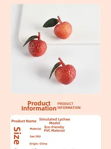 Macro detail of realistic PVC litchi model with textured red peel and green leaf accents