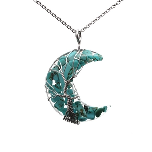 Handmade silver crescent moon pendant necklace with turquoise stones and tree of life wire wrap