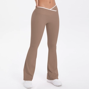 Detail of coffee high waist yoga flare pants with V-cross waistband and white piping trim