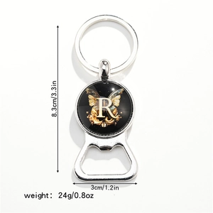 Detail of silver bottle opener keychain with letter R and vintage butterfly pattern