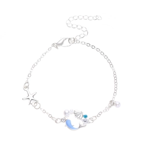 Bracelet argenté avec breloques étoile de mer, queue de dauphin bleue et perles