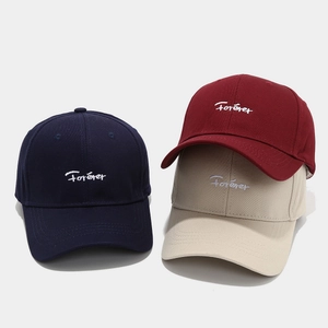 Three baseball caps in navy, burgundy, and beige with Forever embroidery on front