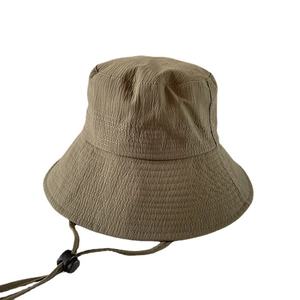 Minimalist Japanese style water ripple texture sun hat with wide brim and adjustable chin strap